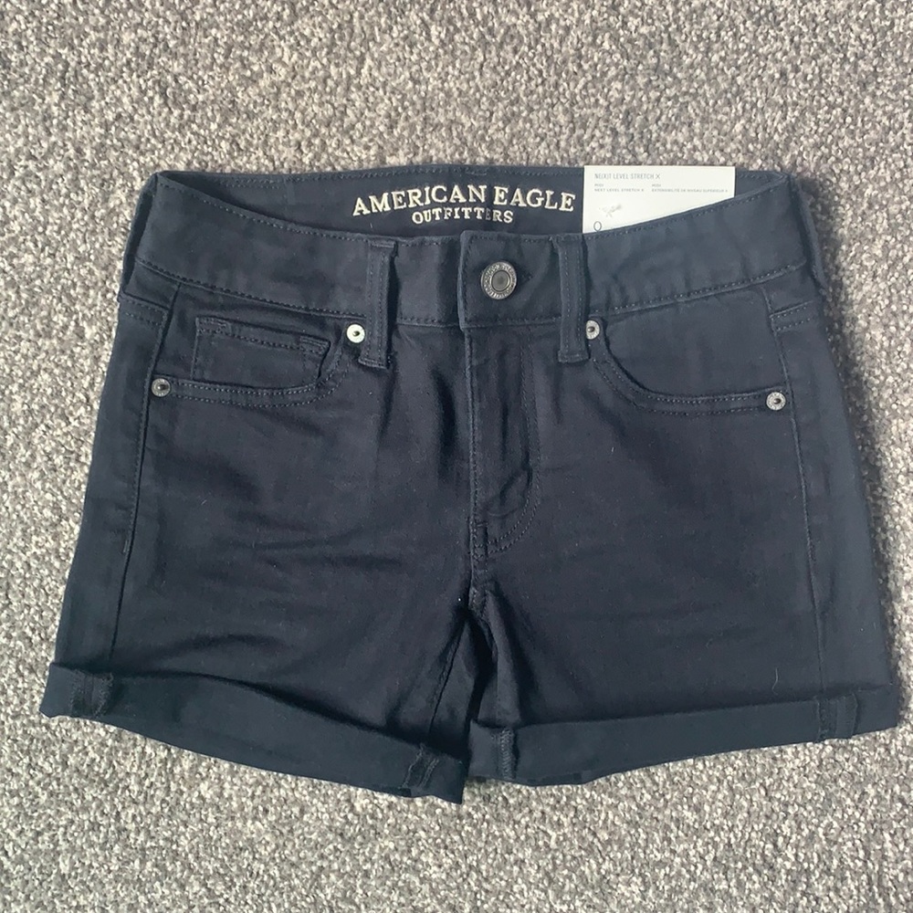 Black shorts, never worn, next level stretch midi